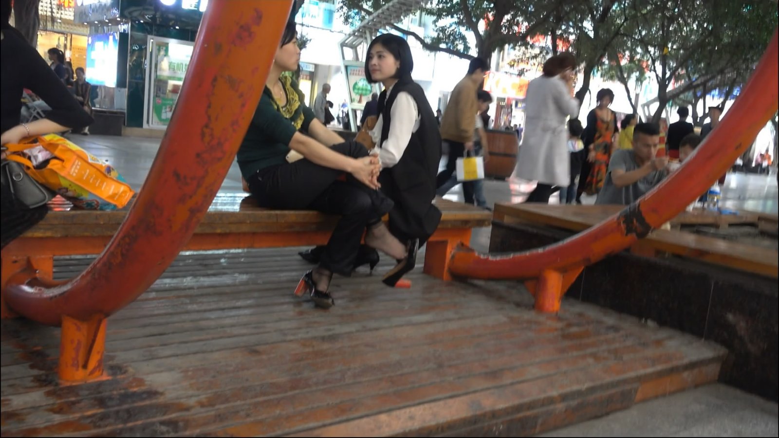 Two talking dangling women